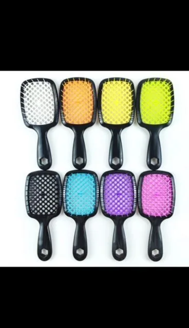 Colorful Hair Brushes Displayed in Rows at Hair Salon